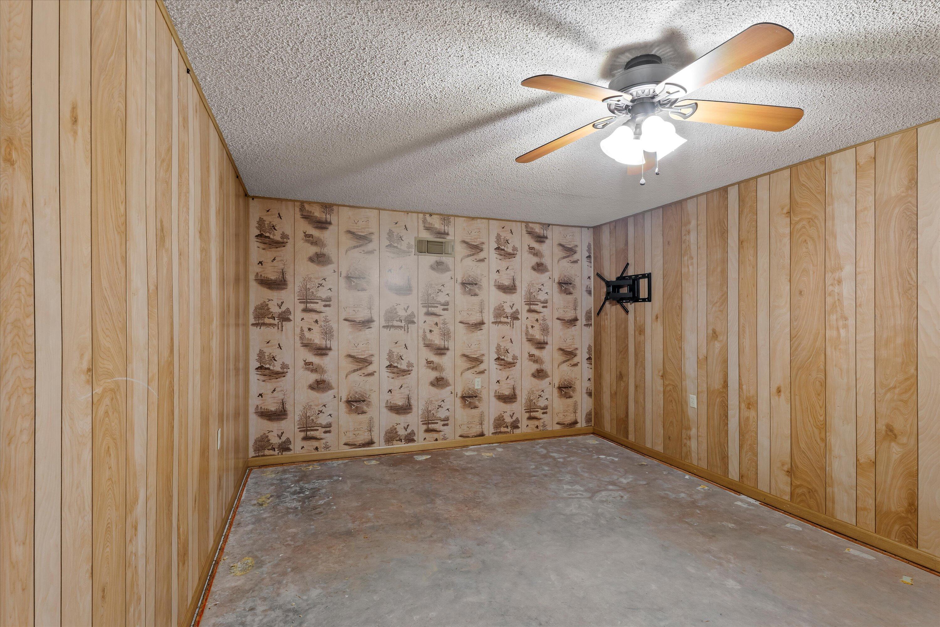 116 East 26th Street Littlefield, TX 79339 - Photo 36 of 40 wooden floor in an empty room