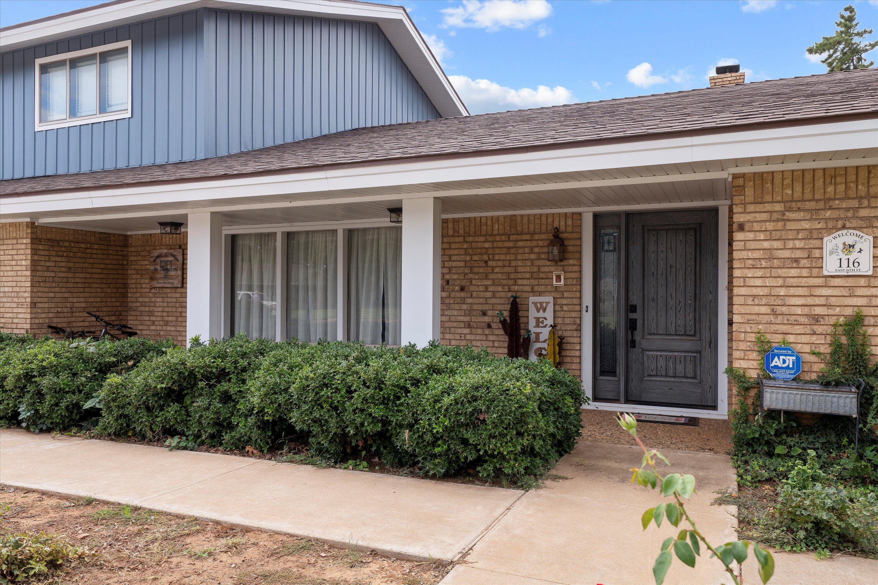 116 East 26th Street Littlefield, TX 79339 - Photo 8 of 40 a view of a house with potted plants