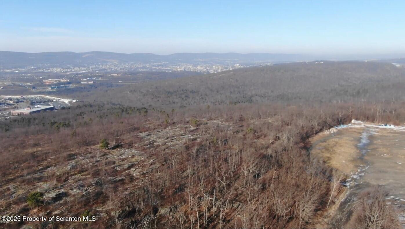 Montage Mt Road Scranton, PA 18507 - Photo 5 of 6 a view of a city with lush green forest