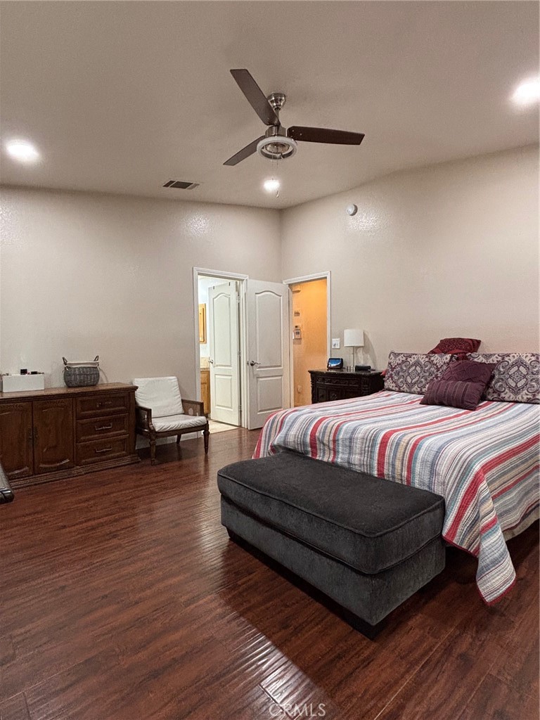 14980 Pendleton Street Hesperia, CA 92345 - Photo 12 of 27 a bedroom with a bed and window