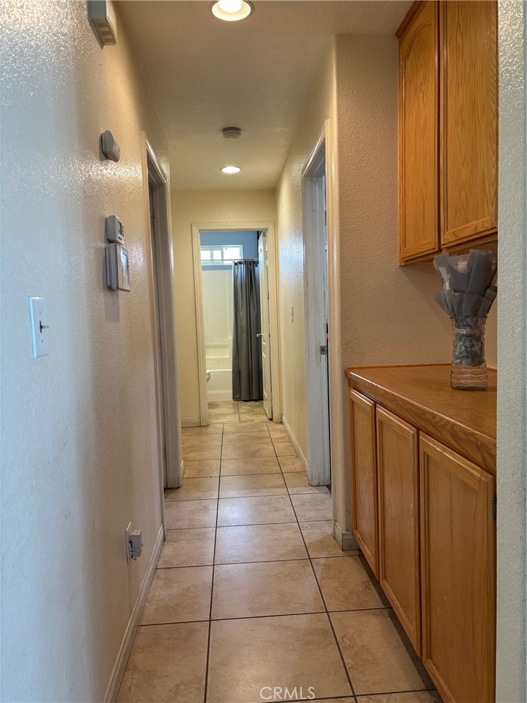 14980 Pendleton Street Hesperia, CA 92345 - Photo 21 of 27 a bathroom with a sink and a mirror