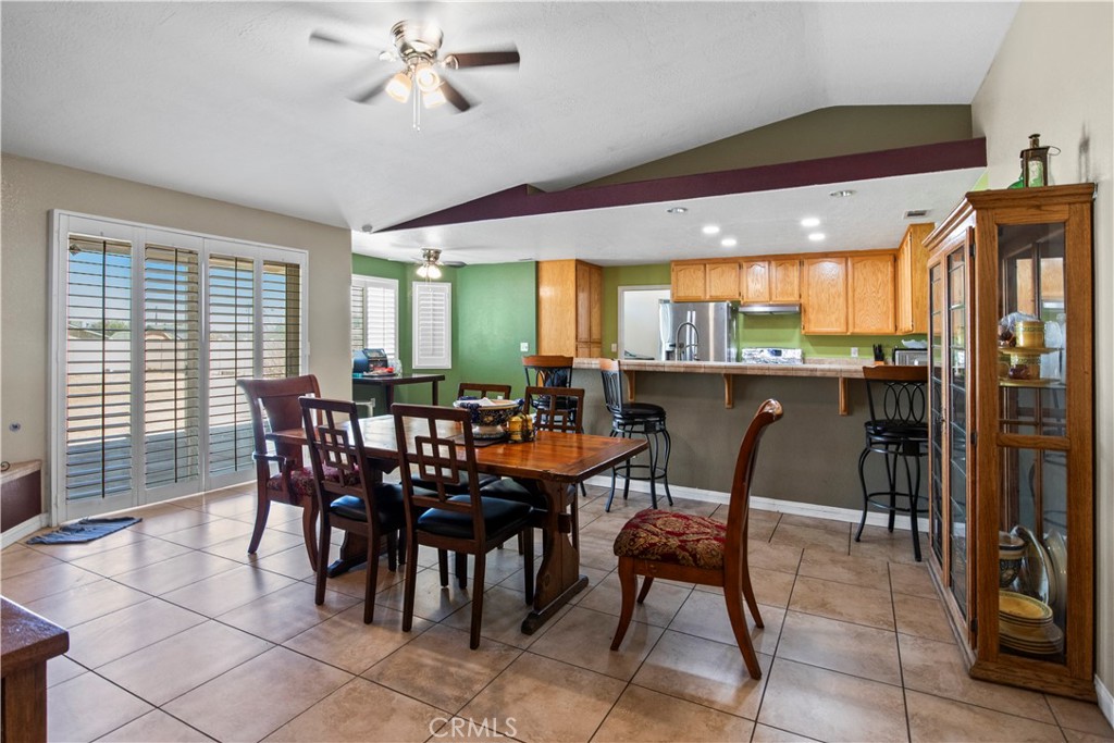 14980 Pendleton Street Hesperia, CA 92345 - Photo 3 of 27 a view of a dining room with furniture