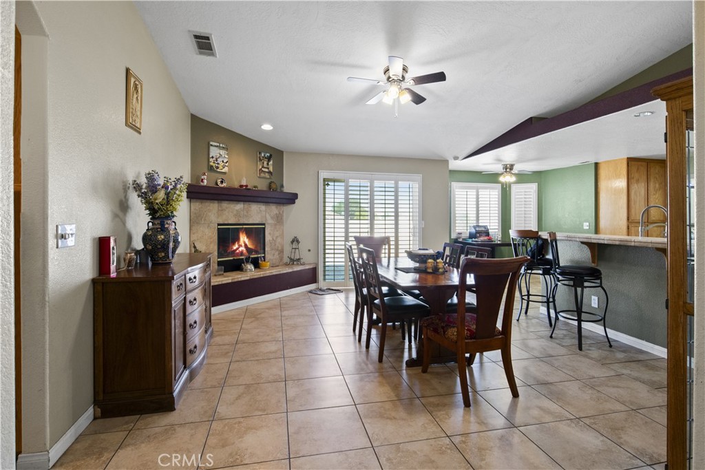 14980 Pendleton Street Hesperia, CA 92345 - Photo 4 of 27 a view of a dining room with furniture and chandelier