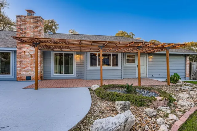 a view of a house with a patio