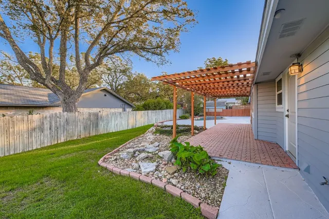 a view of a porch with a yard