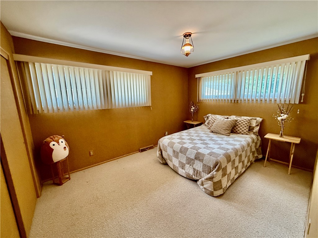 114 Columbus Drive Decatur, IL 62526 - Photo 18 of 29 a bedroom with a bed and a window