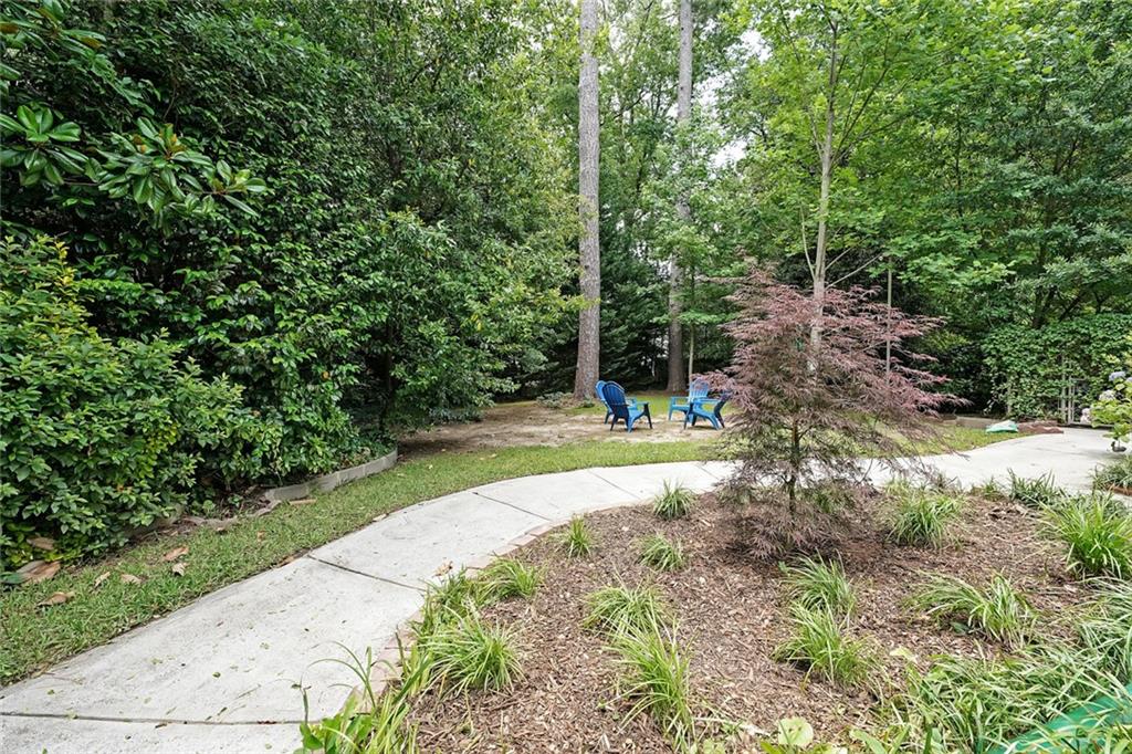 167 Garden Lane Decatur, GA 30030 - Photo 18 of 18 a view of a yard with plants and large trees