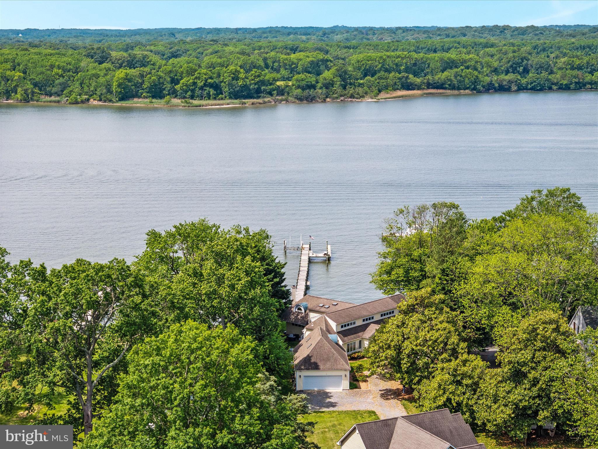 1601 Cliff Drive Edgewater, MD 21037 - Photo 14 of 86 an aerial view of a house with a yard and lake view