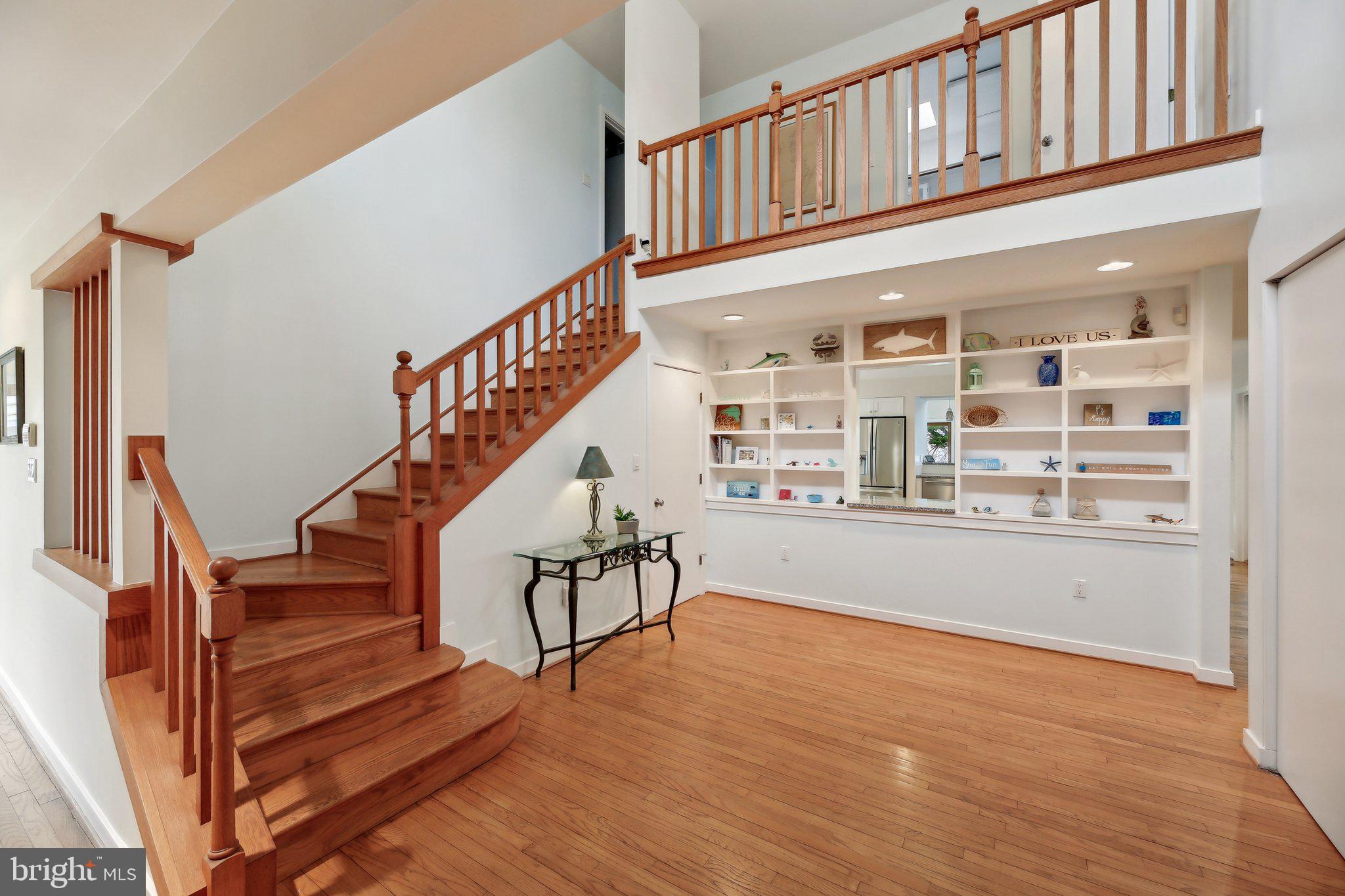 1601 Cliff Drive Edgewater, MD 21037 - Photo 16 of 86 a view of staircase with white walls and a window