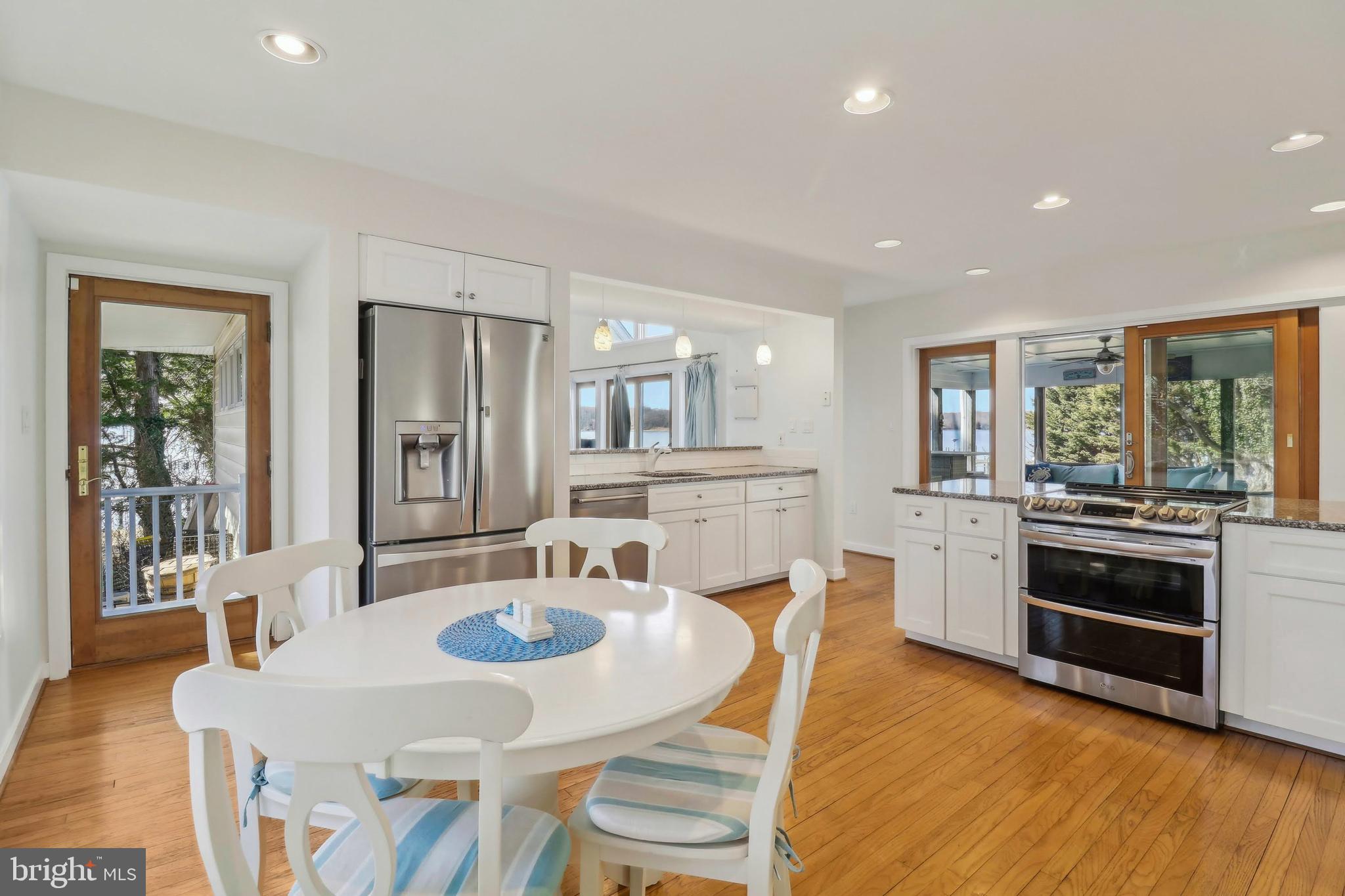 1601 Cliff Drive Edgewater, MD 21037 - Photo 20 of 86 a view of a dining room with furniture and wooden floor