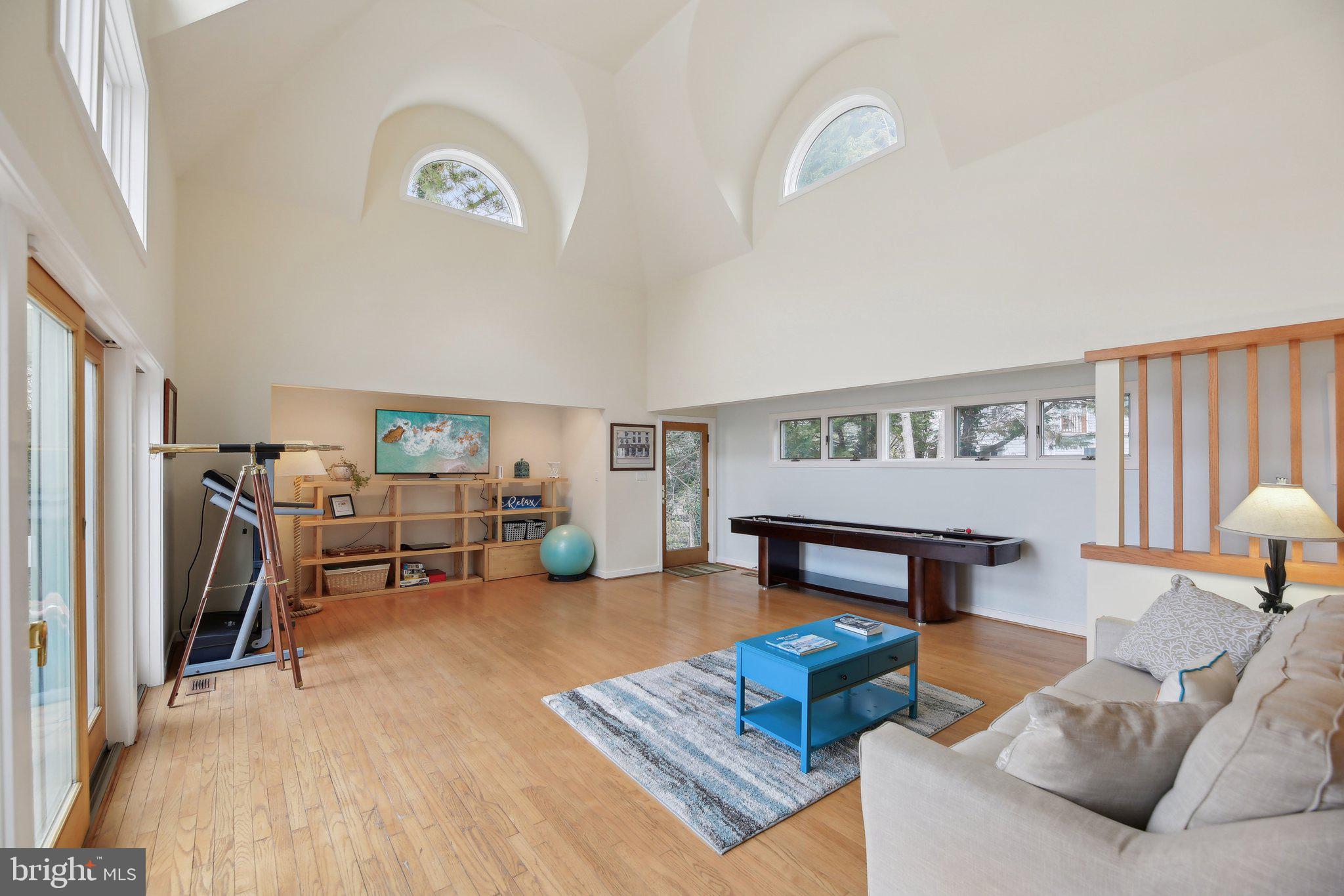 1601 Cliff Drive Edgewater, MD 21037 - Photo 28 of 86 a living room with furniture and a table