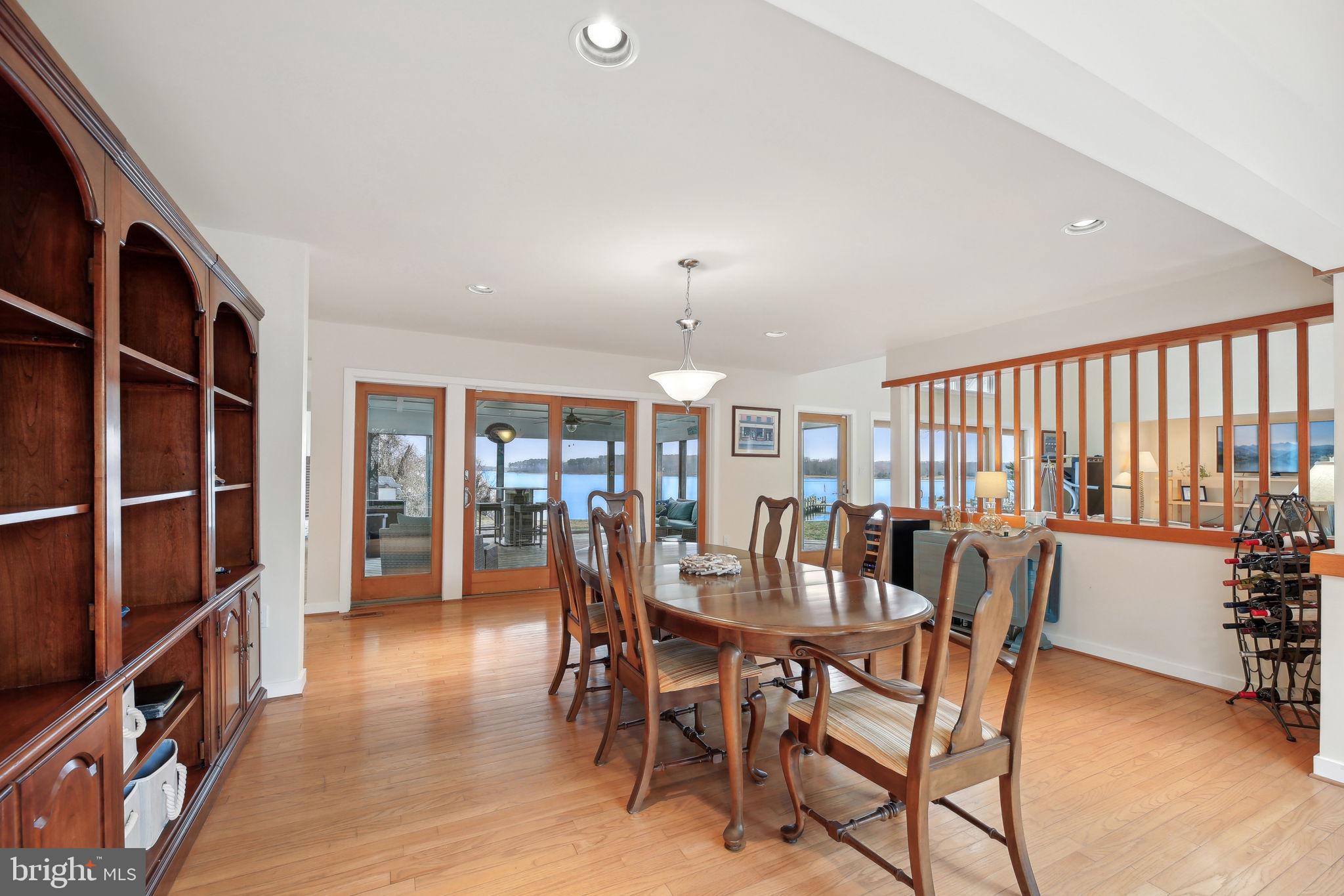 1601 Cliff Drive Edgewater, MD 21037 - Photo 32 of 86 a view of a dining room with furniture and a window