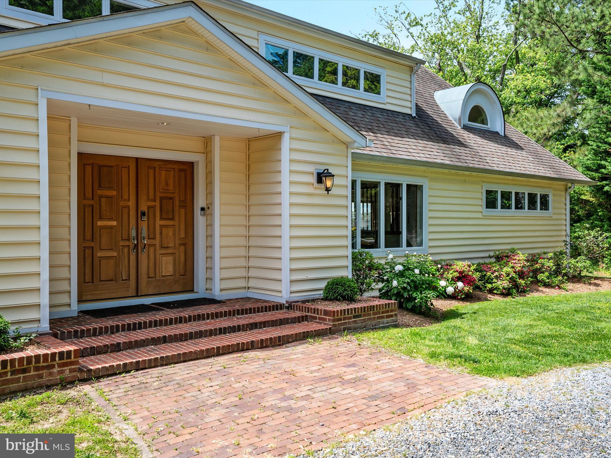 1601 Cliff Drive Edgewater, MD 21037 - Photo 4 of 86 a front view of a house with garden