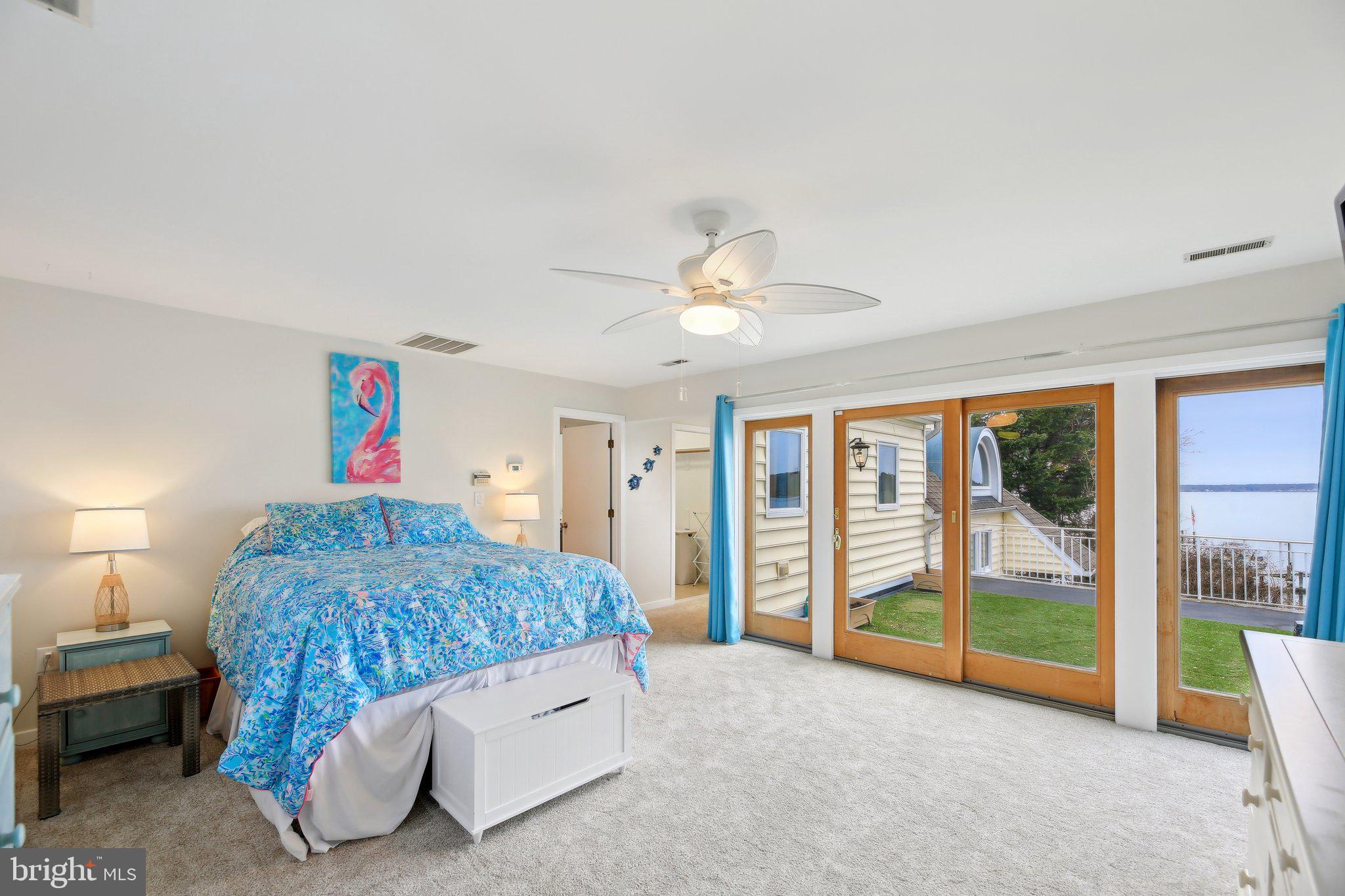 1601 Cliff Drive Edgewater, MD 21037 - Photo 42 of 86 a bedroom with a bed and a large window