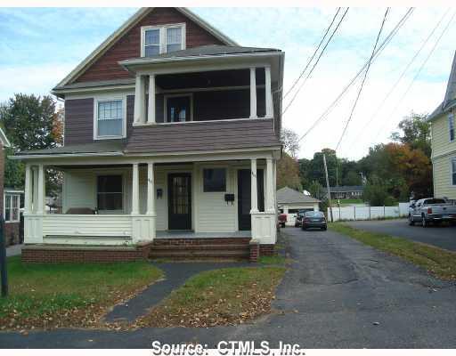 415 Litchfield Street Torrington, CT 06790 - Photo 1 of 1 a view of a house with a yard