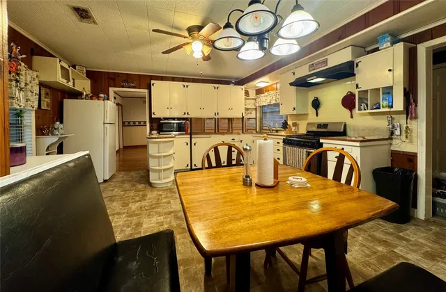 a view of a dining room with furniture