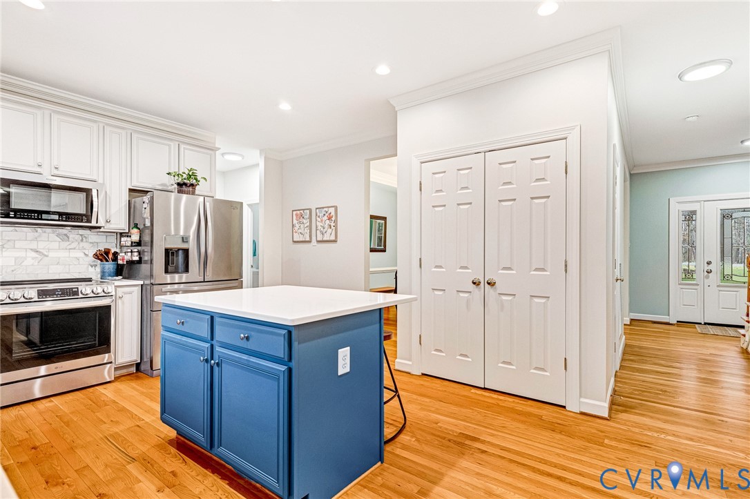 14436 Overlook Ridge Lane Beaverdam, VA 23015 - Photo 15 of 82 One of 3 pantries is located behind those doors!