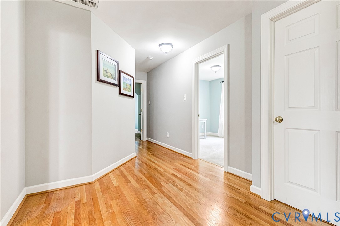 14436 Overlook Ridge Lane Beaverdam, VA 23015 - Photo 34 of 82 Hardwood floors at upstairs landing and hallway!