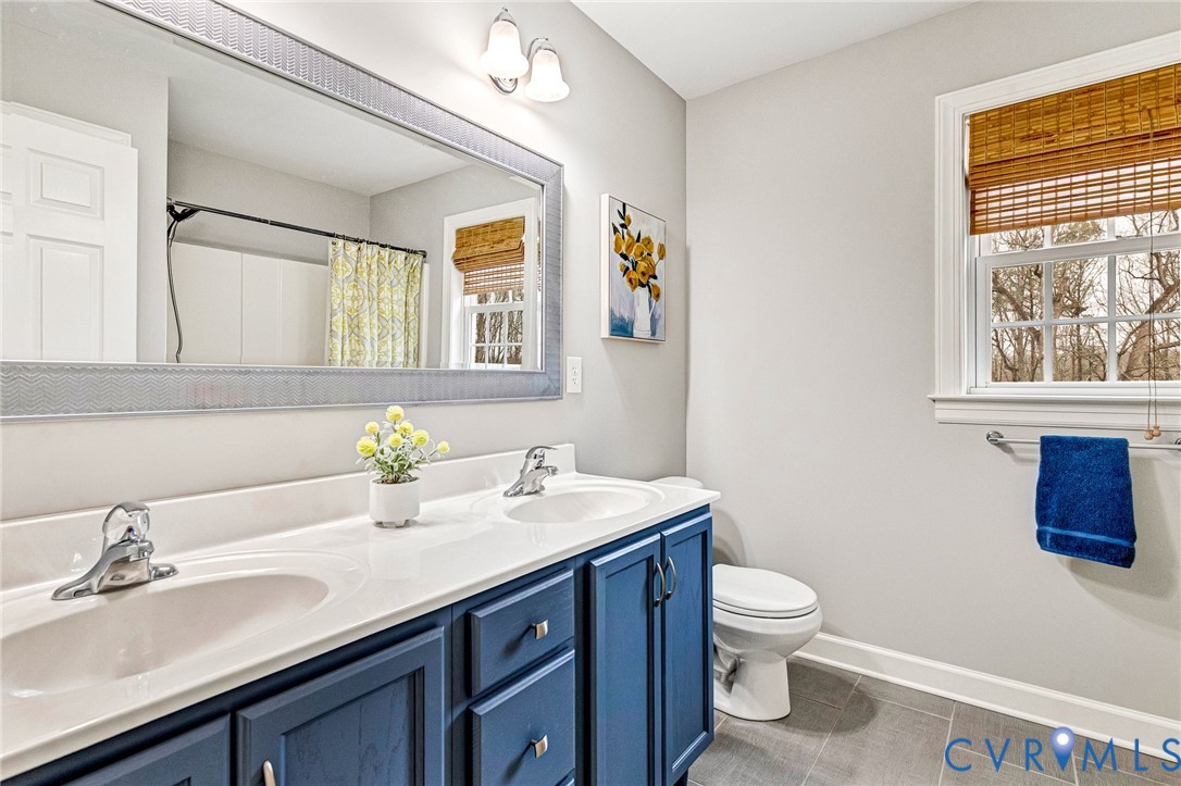 14436 Overlook Ridge Lane Beaverdam, VA 23015 - Photo 39 of 82 Renovated Hall bath with tile plank flooring & dou