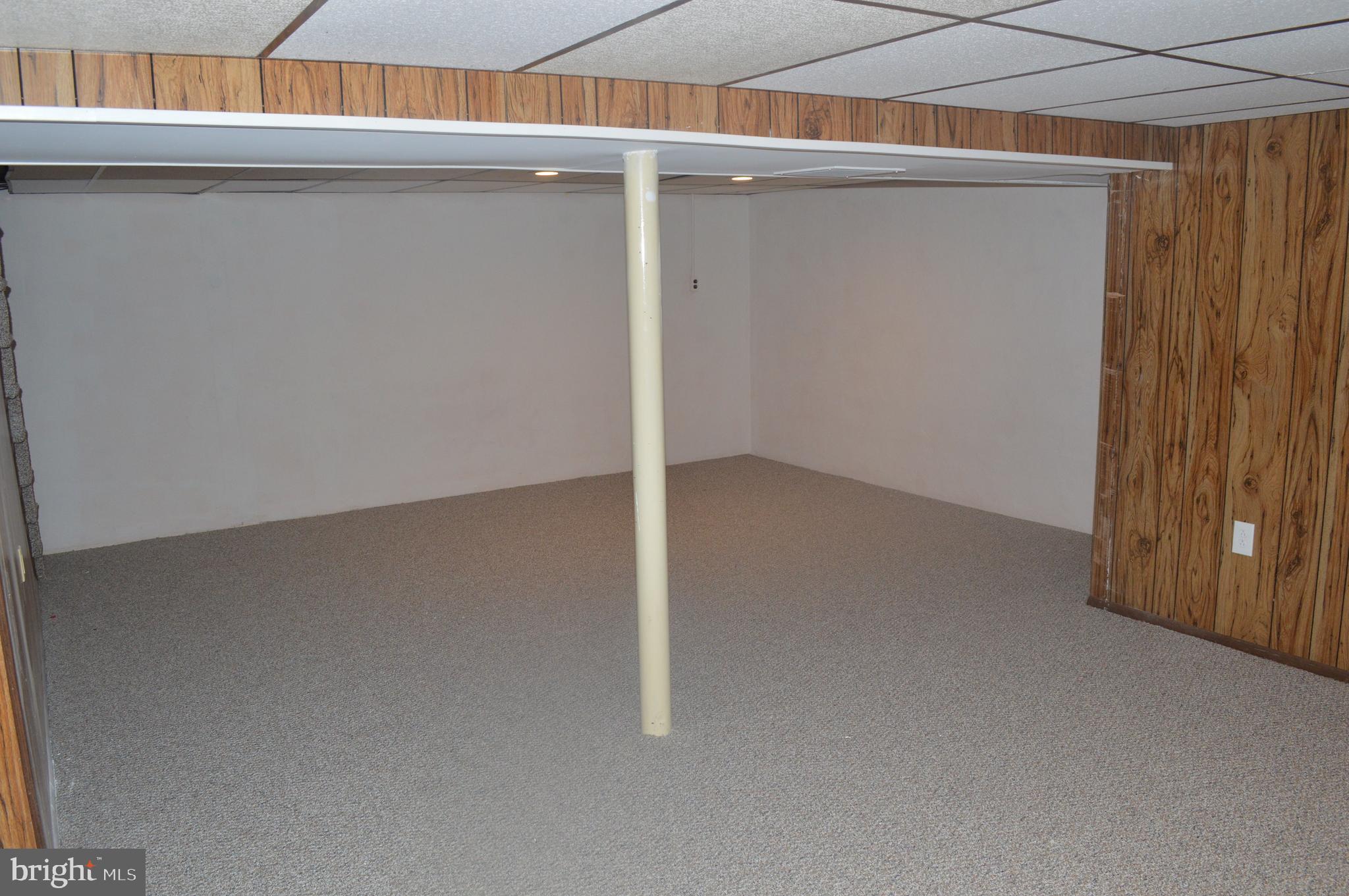 162 Ridge Boulevard Brookhaven, PA 19015 - Photo 35 of 39 Family room with new carpet