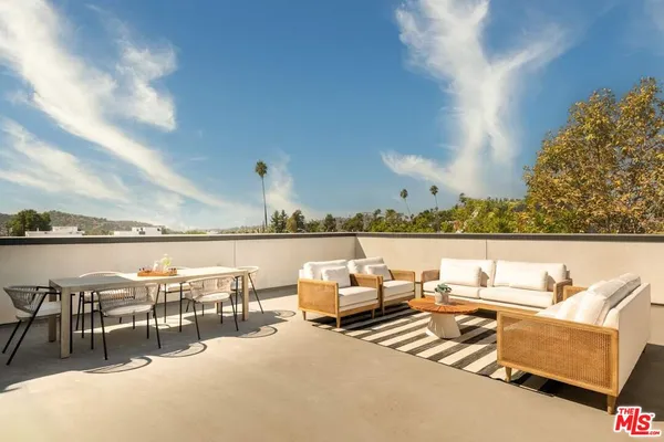 an outdoor space with patio ocean view and ocean view