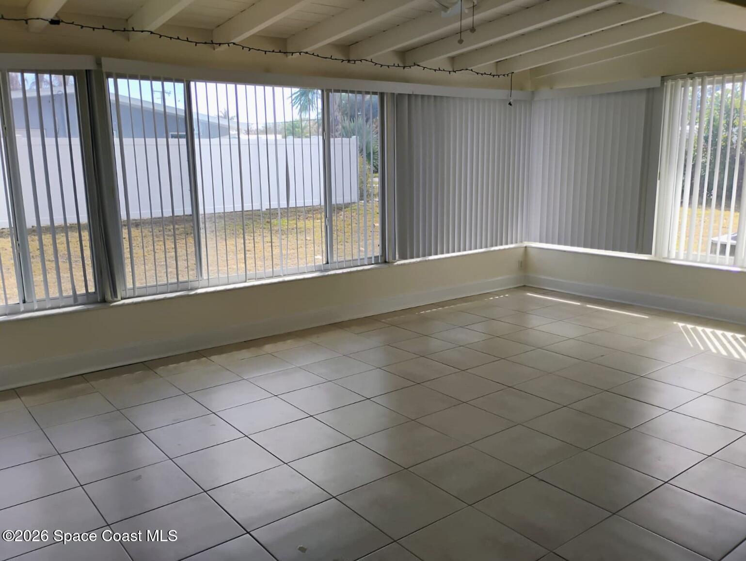 2310 Reef Avenue Indialantic, FL 32903 - Photo 6 of 13 a view of an empty room and a window