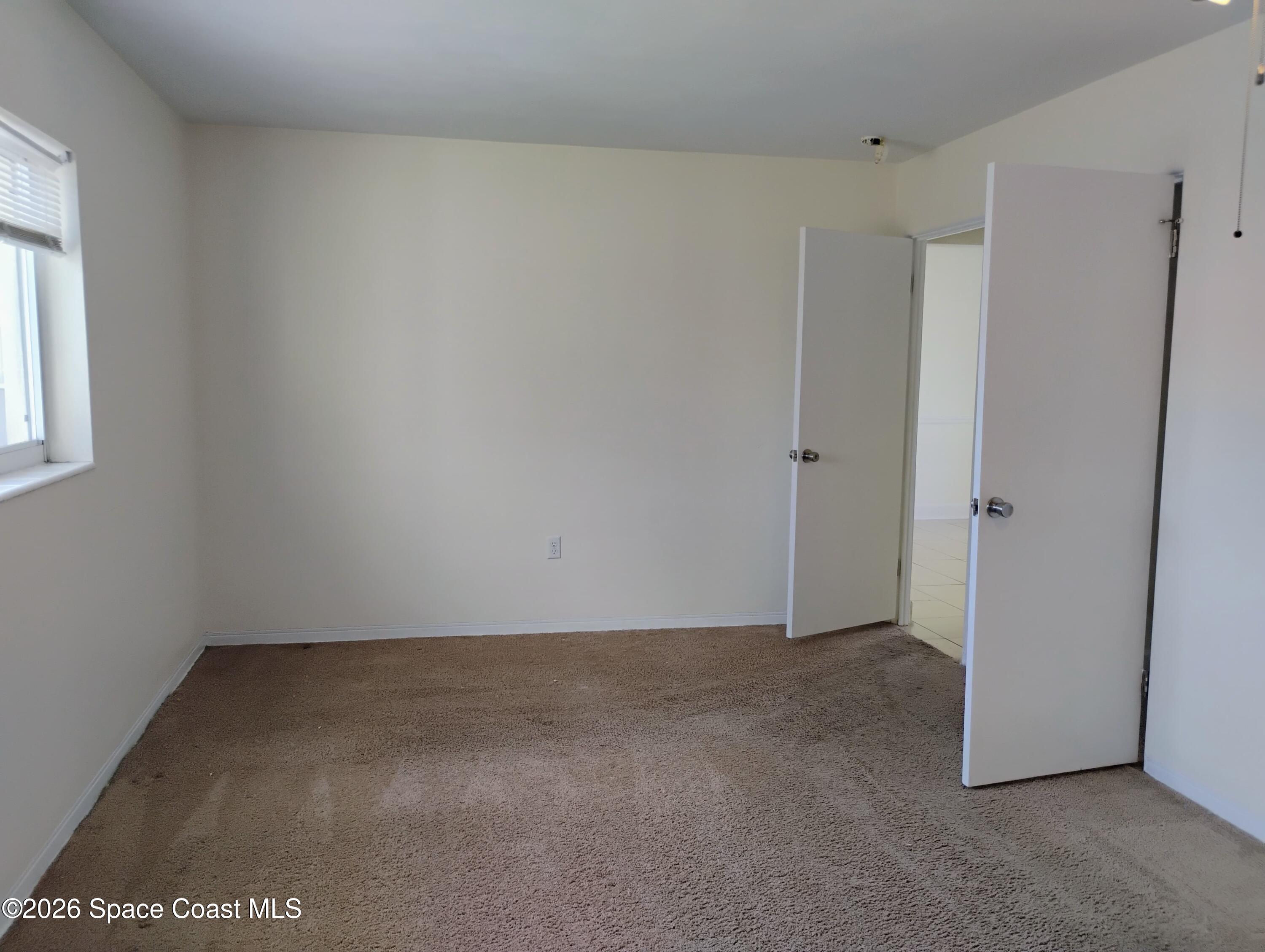 2310 Reef Avenue Indialantic, FL 32903 - Photo 9 of 13 a view of an empty room