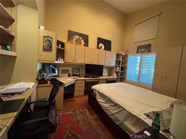 a bed room with a bed and furniture