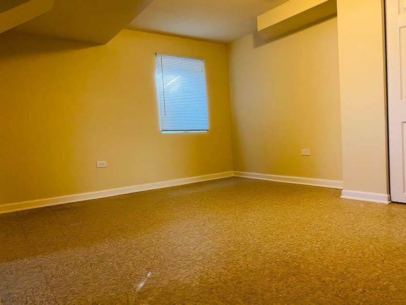 17543 Roy Street Lansing, IL 60438 - Photo 11 of 13 a view of an empty room with window