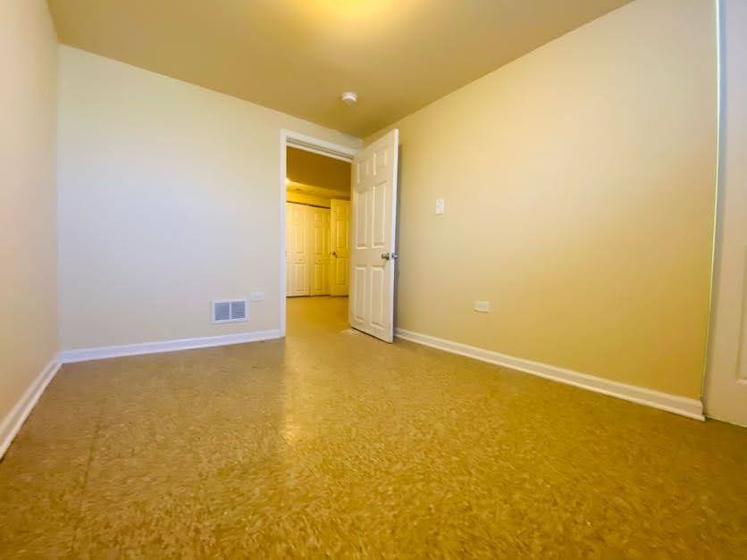 17543 Roy Street Lansing, IL 60438 - Photo 7 of 13 a view of empty room
