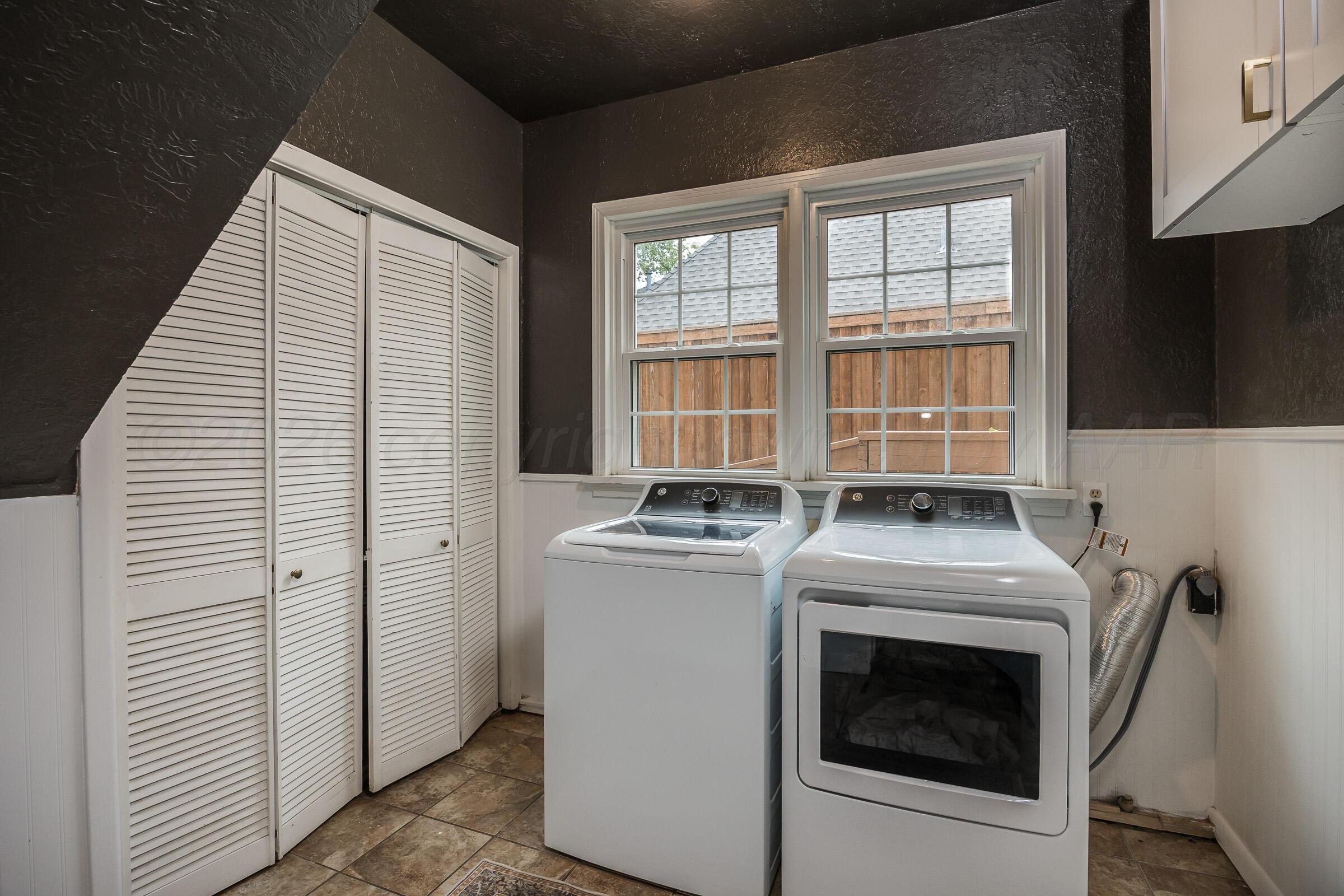 2102 South Hayden Street Amarillo, TX 79109 - Photo 21 of 44 a stove top oven sitting inside of a kitchen