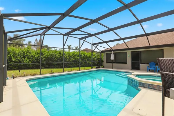 a view of swimming pool with a yard