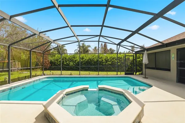 a view of yard with swimming pool