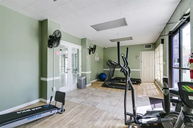 a view of a room with gym equipment
