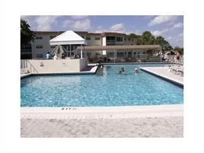 a view of a yard with an outdoor space