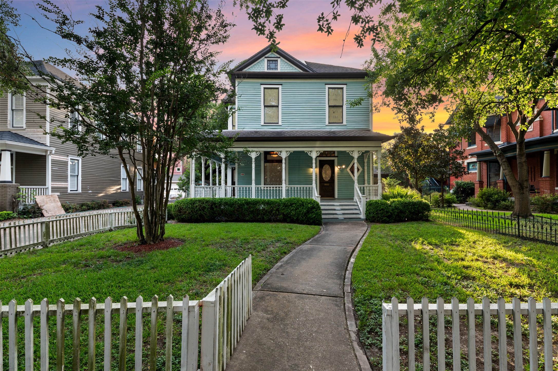 a front view of a house with yard