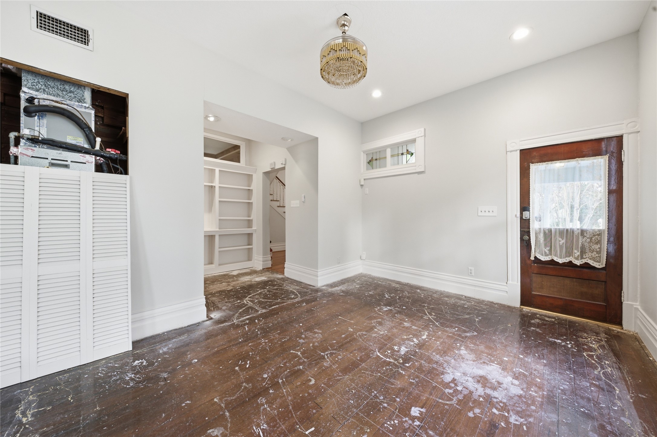 1007 Heights Boulevard Houston, TX 77008 - Photo 11 of 50 a view of livingroom with hardwood floor and window