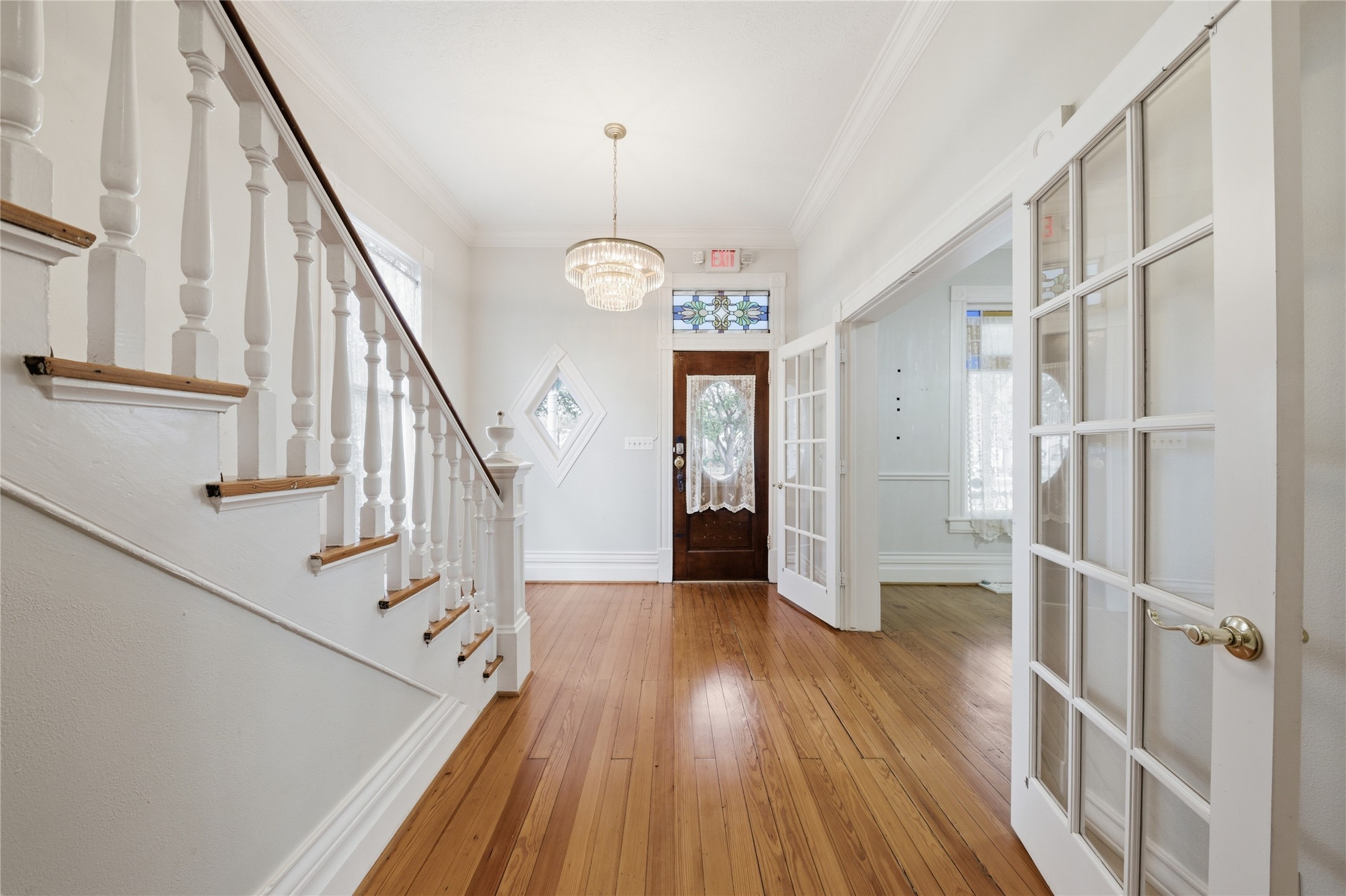 1007 Heights Boulevard Houston, TX 77008 - Photo 14 of 50 a view of entryway with wooden floor and stairs