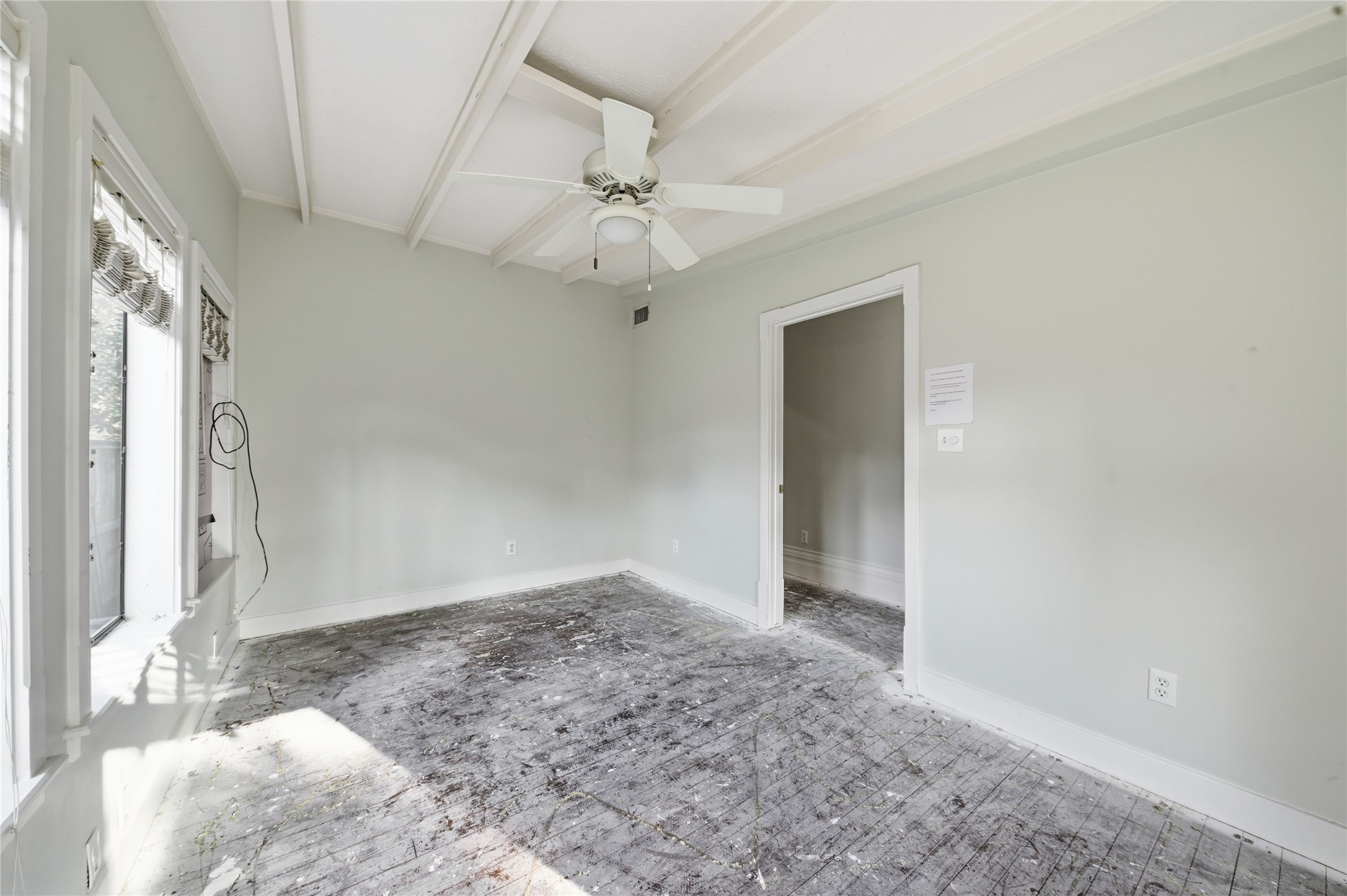 1007 Heights Boulevard Houston, TX 77008 - Photo 24 of 50 a view of an empty room with a chandelier fan