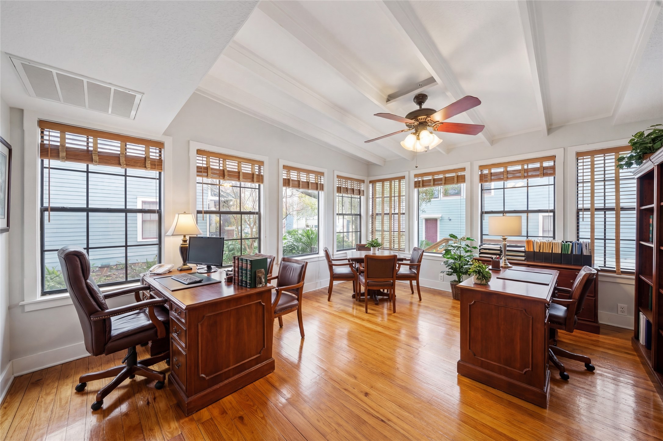1007 Heights Boulevard Houston, TX 77008 - Photo 27 of 50 a workspace with furniture window and wooden floor