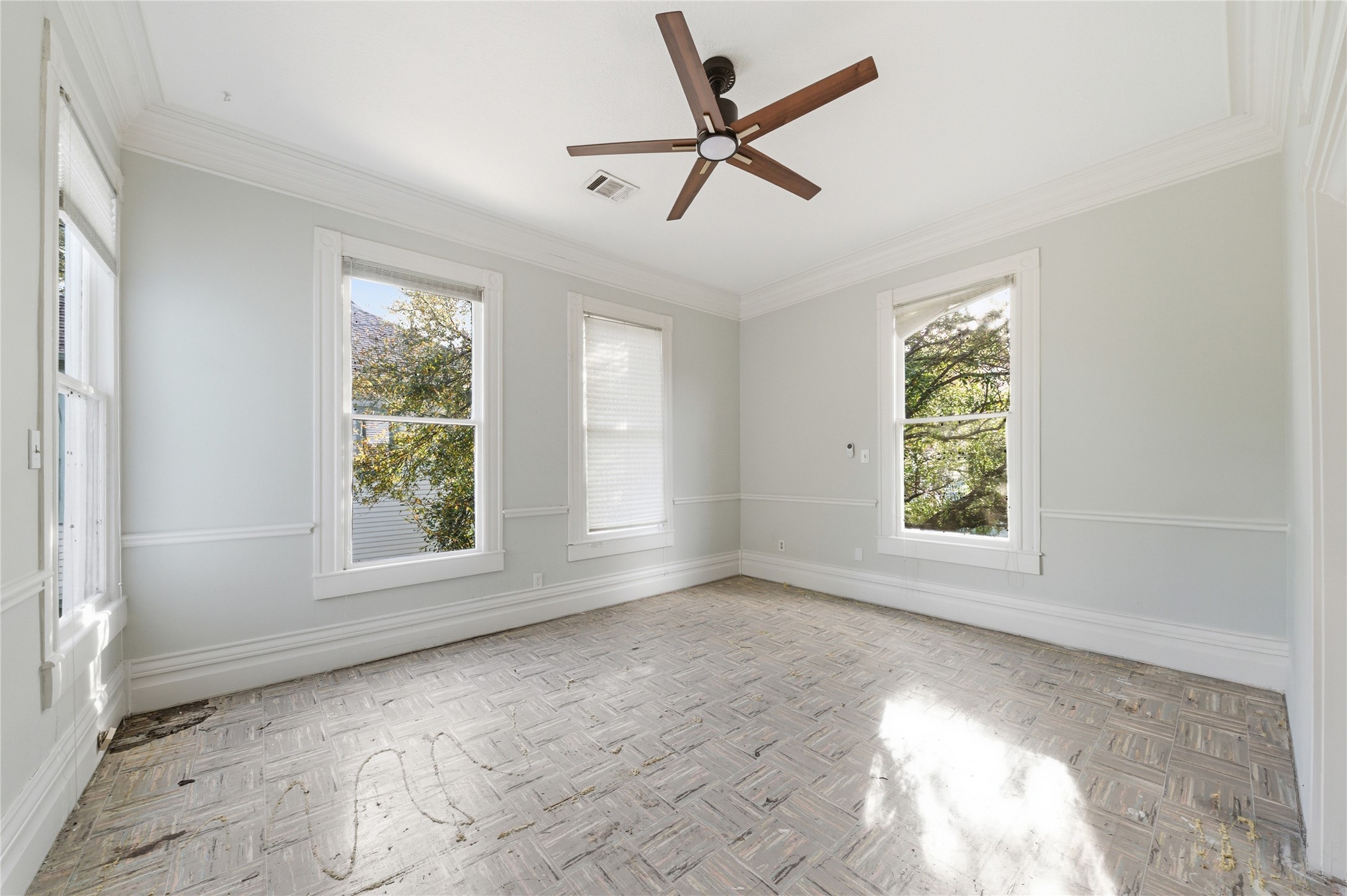1007 Heights Boulevard Houston, TX 77008 - Photo 33 of 50 a view of a livingroom with a ceiling fan and window