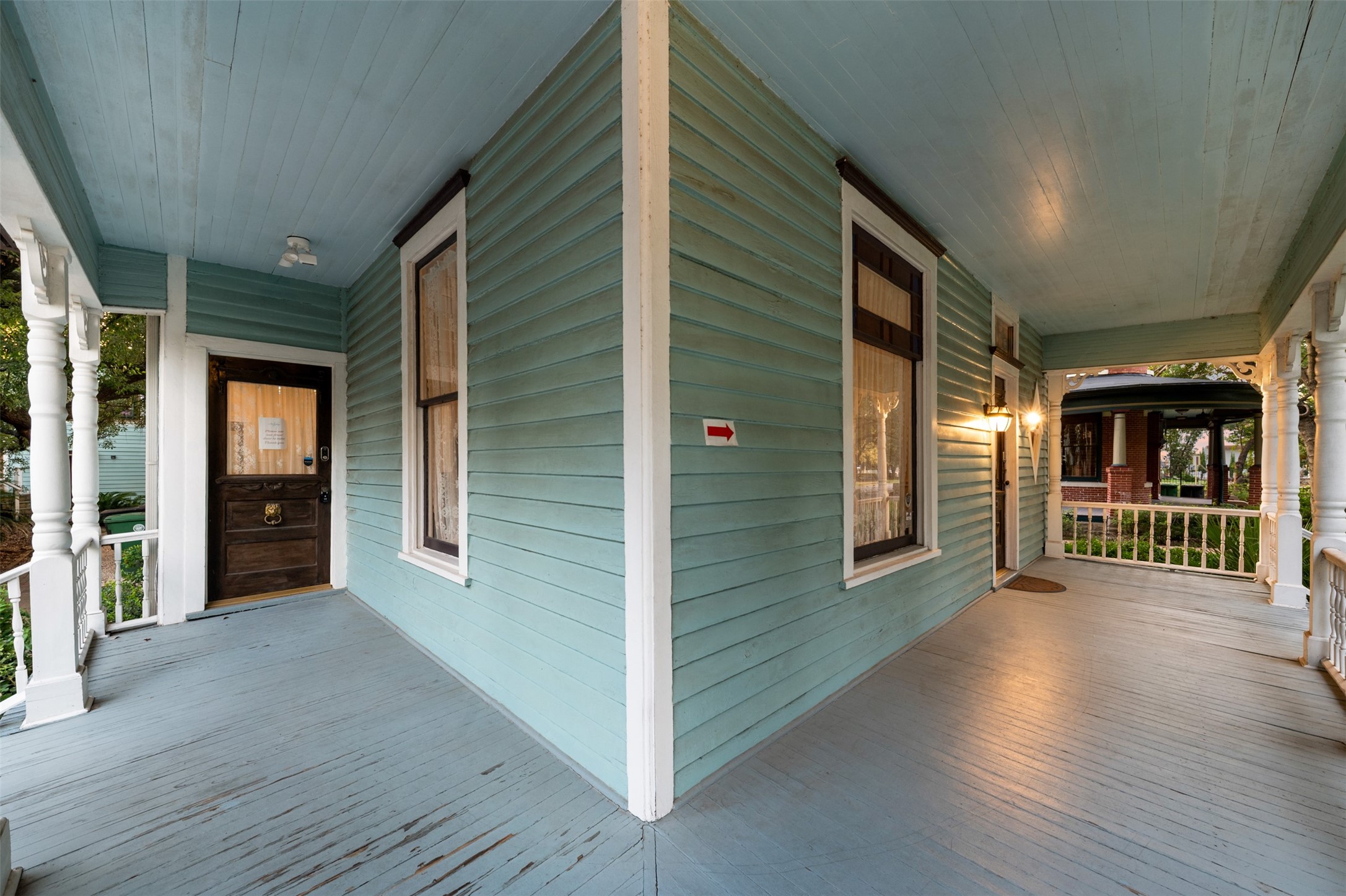 1007 Heights Boulevard Houston, TX 77008 - Photo 5 of 50 a view of a porch with wooden floor and stairs