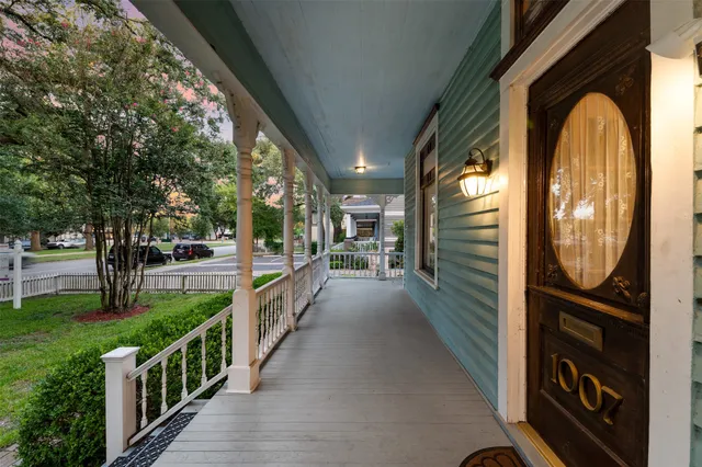 a view of a porch and garden