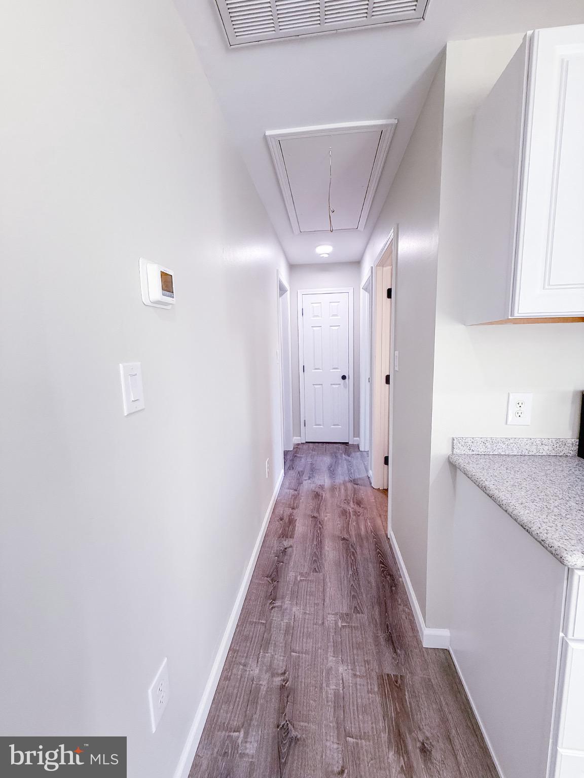 18558 Oak Road Bridgeville, DE 19933 - Photo 25 of 36 Bright and inviting hallway with modern finishes.