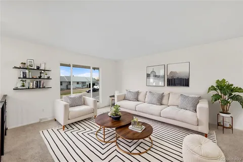 a living room with furniture and a couch