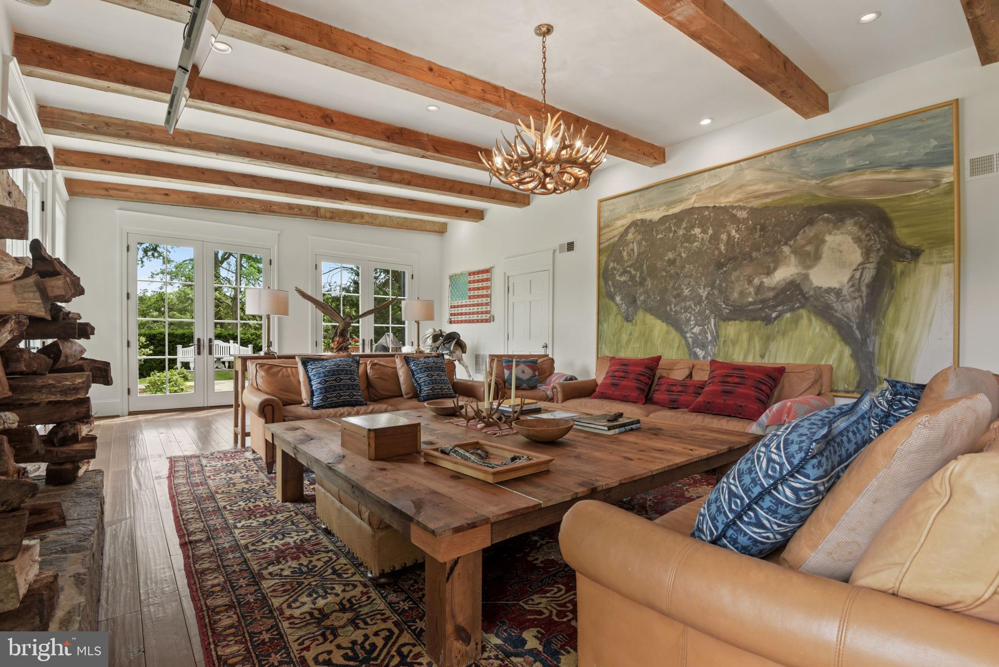 1101 Chain Bridge Road McLean, VA 22101 - Photo 15 of 54 a living room with furniture and a potted plant