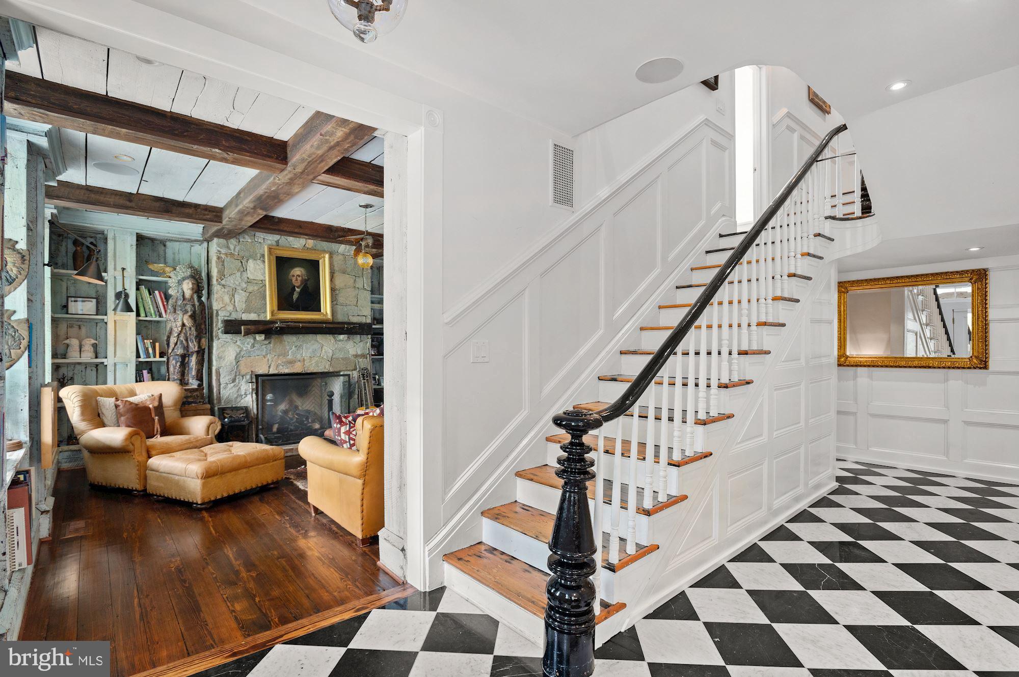 1101 Chain Bridge Road McLean, VA 22101 - Photo 3 of 54 a view of entryway and hall with wooden floor