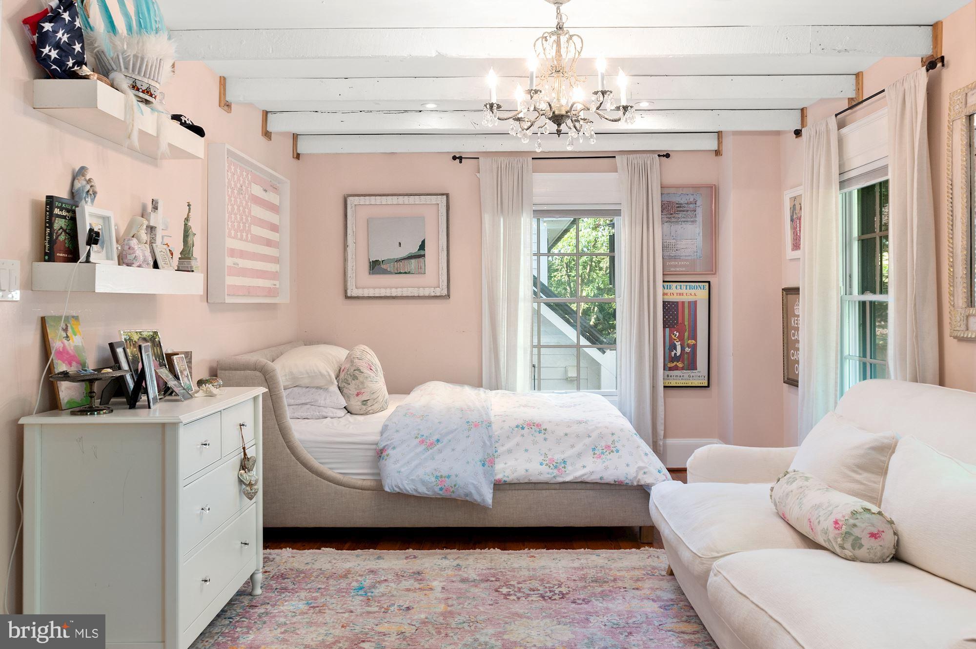 1101 Chain Bridge Road McLean, VA 22101 - Photo 31 of 54 a living room with furniture and a chandelier