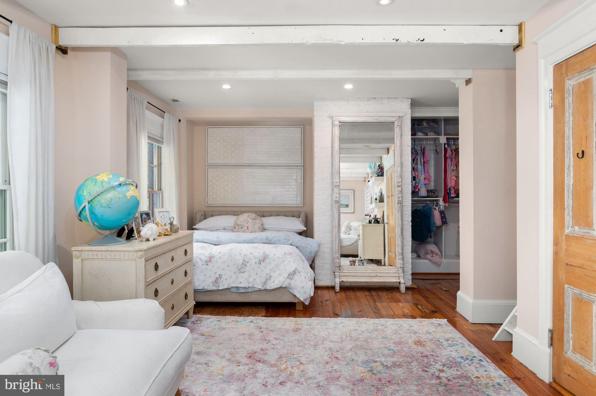 1101 Chain Bridge Road McLean, VA 22101 - Photo 32 of 54 a bedroom with a bed and a potted plant