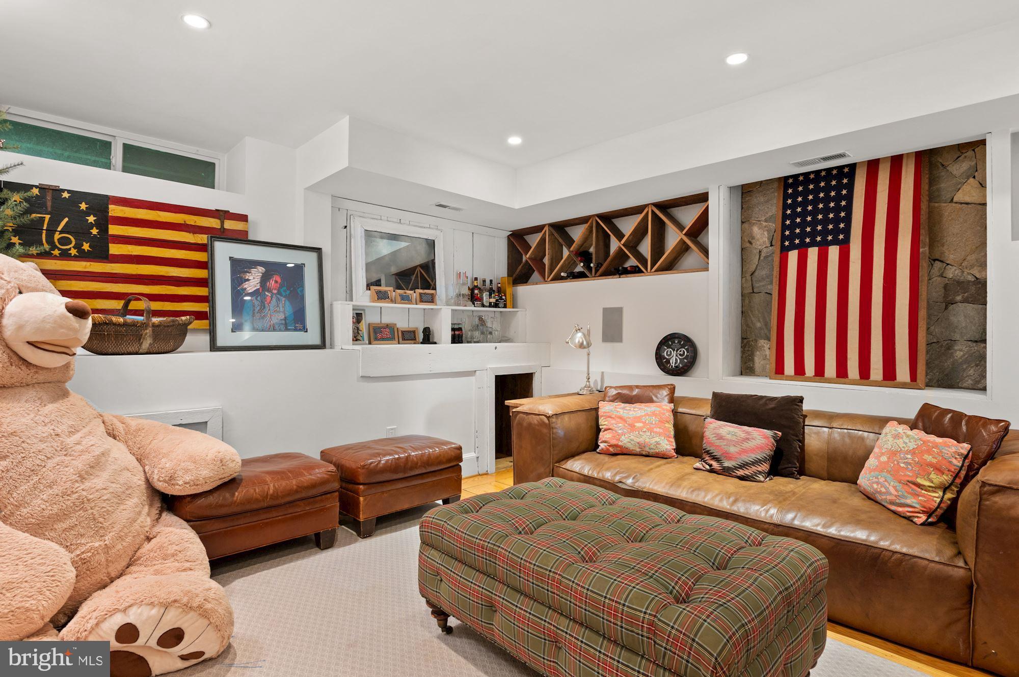 1101 Chain Bridge Road McLean, VA 22101 - Photo 41 of 54 a living room with furniture and a large window